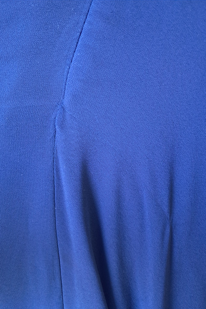 Slight Pull to fabric near zip on the back of the dress