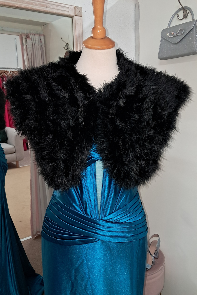 front of black feather shrug