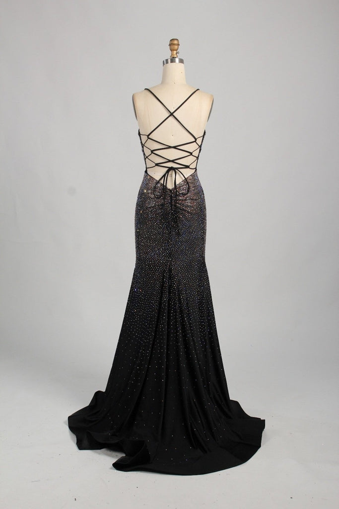 dress on a mannequin backless black and jewelled