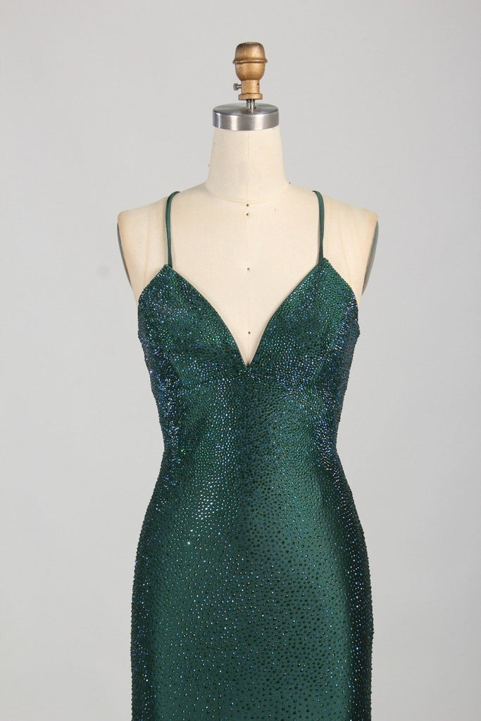 close up of green dress with rhinestones