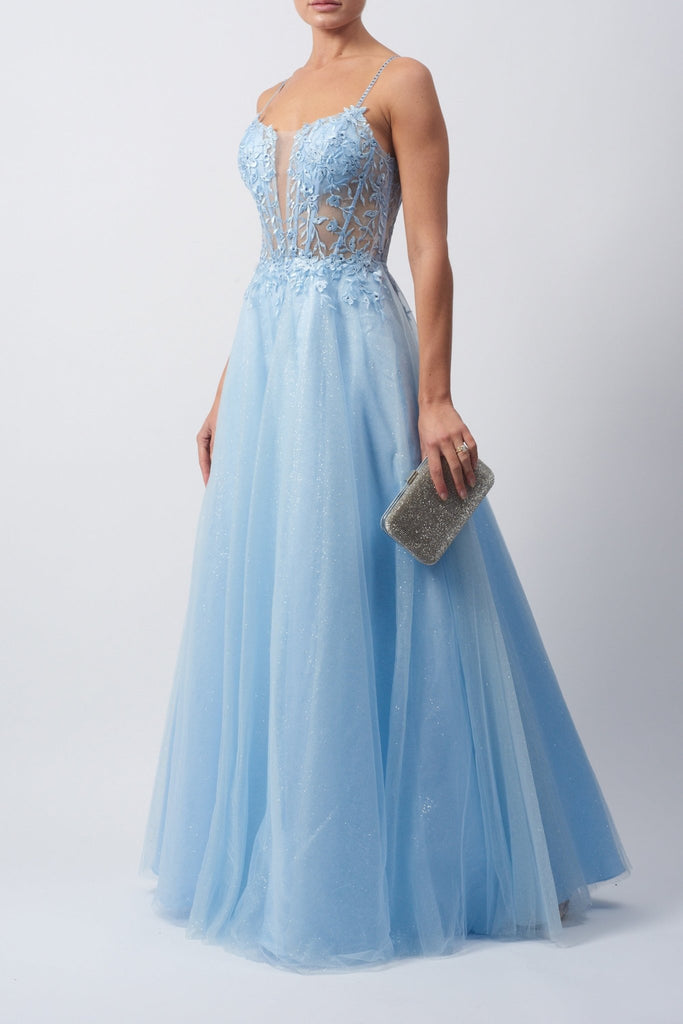 Model wearing Baby Blue Tulle Glitter Prom Dress by Mascara London, front view