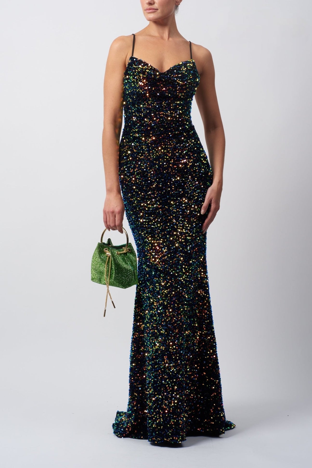 Young female standing in a Multicoloured Sequin Black Velvet Dress